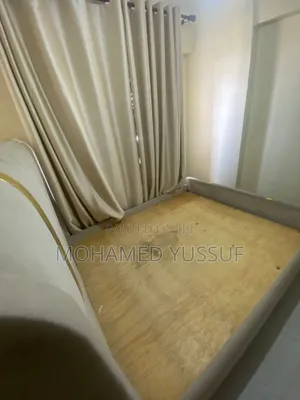 Beige Upholstered Platform Bed