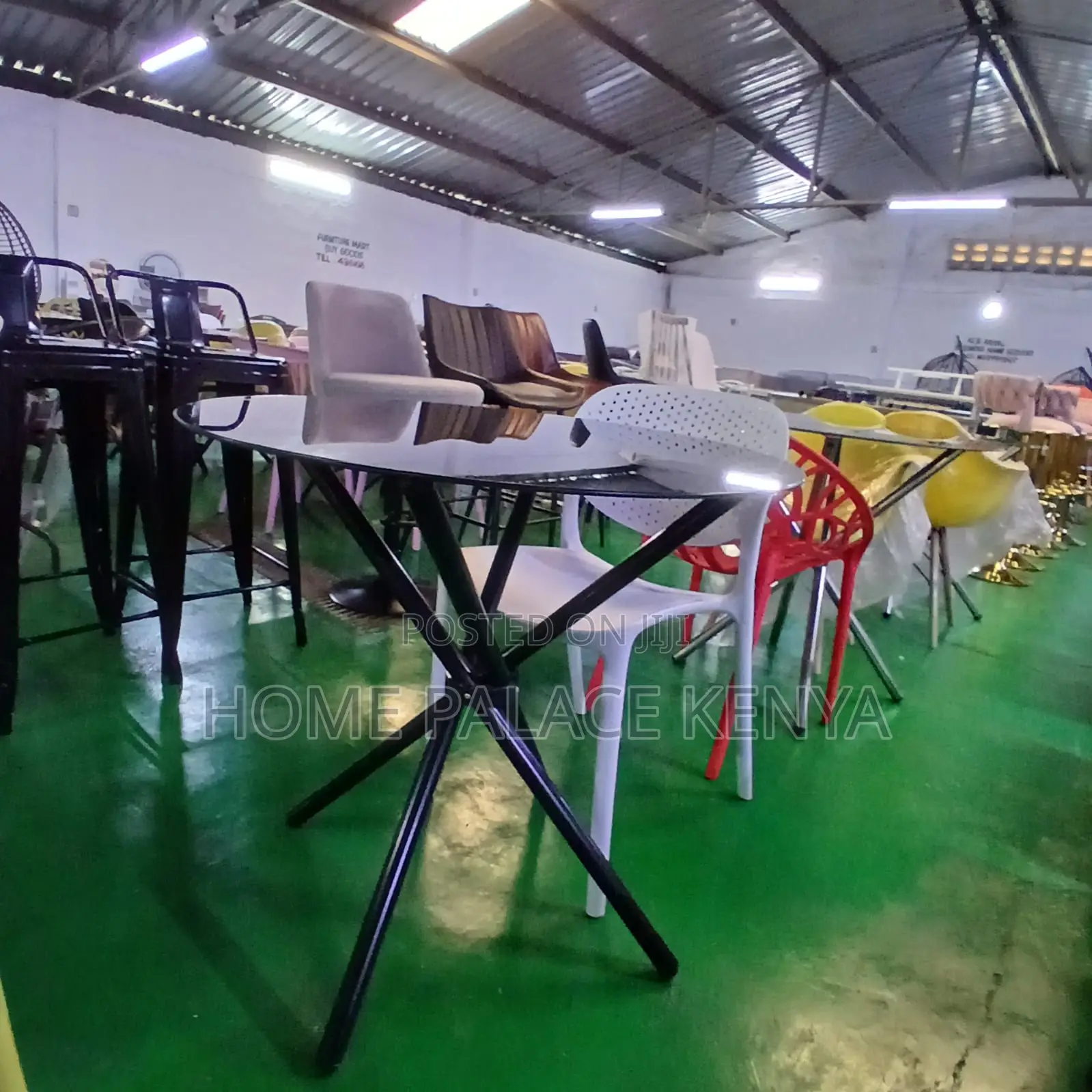 Dining Table: Circular Glass Table With Tripod Base for Two