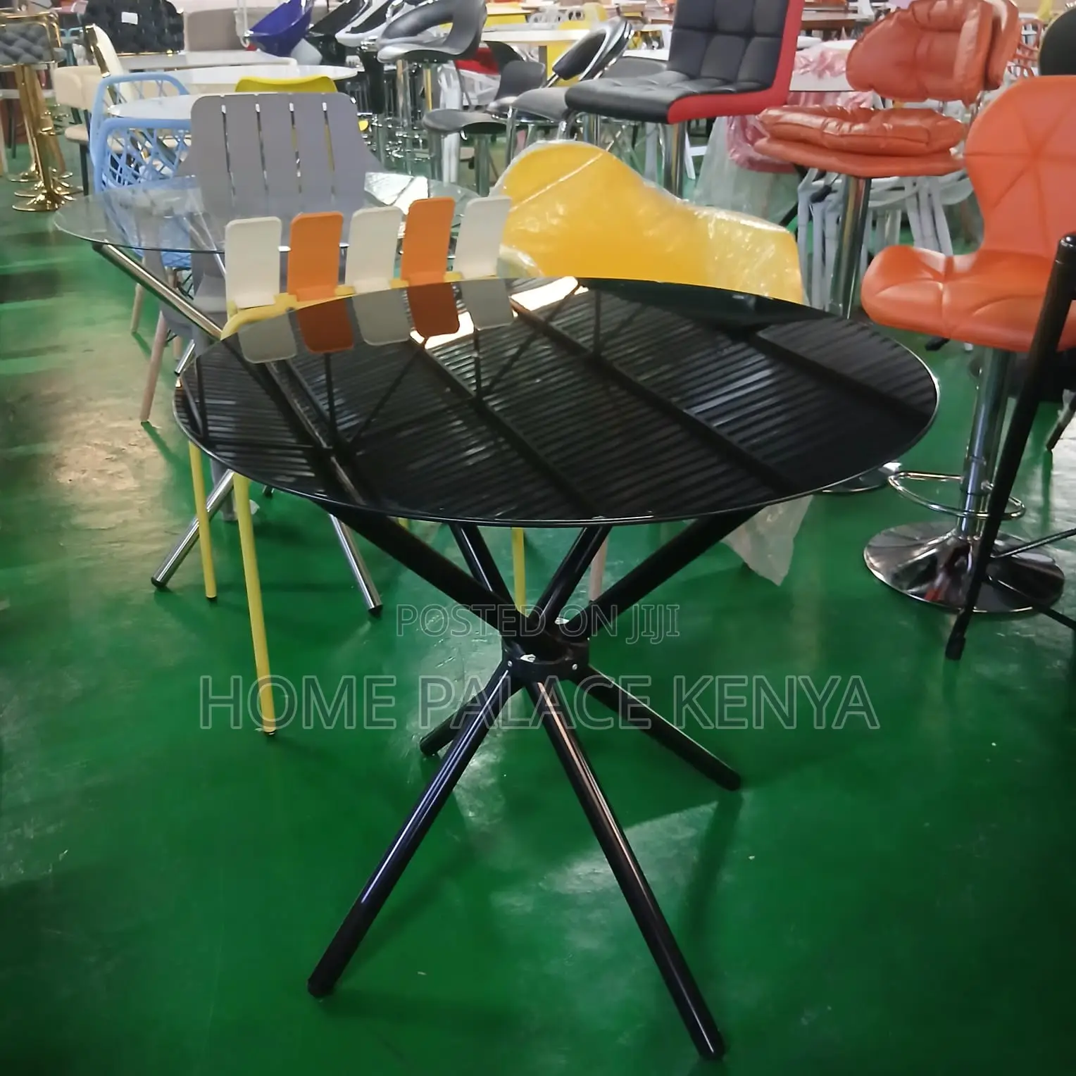 Dining Table: Circular Glass Table With Tripod Base for Two