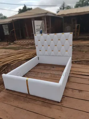 Elegant White Upholstered Bed