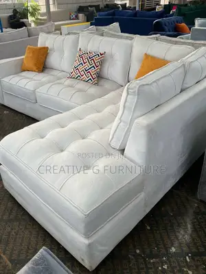 Elegant 6‐Seater White Tufted L‐Shaped Sofa