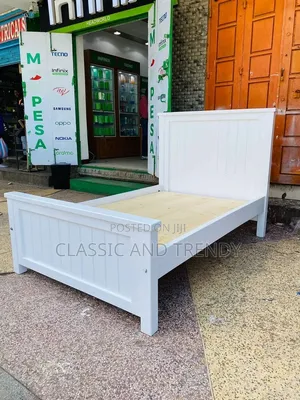 White Bed Made of Wood and Board