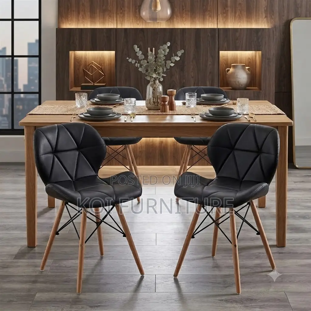 Dining Chairs; Black Butterfly Style Eames Chairs