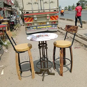 Balls High Table With Polished Wood Chairs