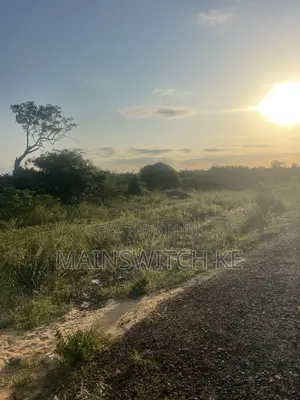 Quarter an Acre at Touching Tarmac Road.