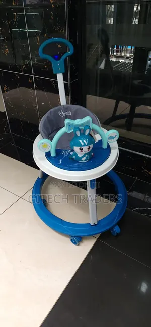 Baby Walker With Toys and a Push Handle