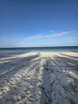 2.5 Acres Beach Front for Sale in Diani Galu WTH an Old House as Block