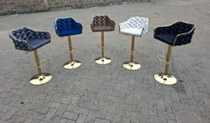 Luxury Velvet and Adjustable Bar Stool With a Golden Base JKL