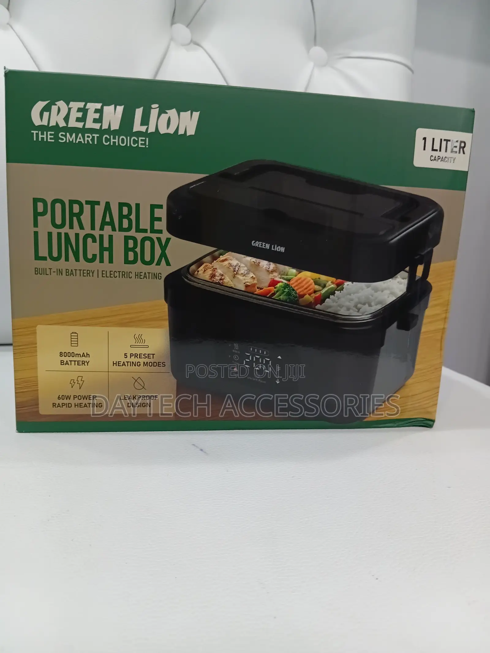 This Is a Green Lion Portable Lunch Box in Black.