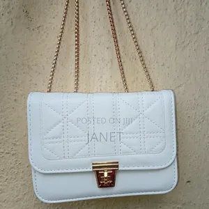 Elegant White Quilted Ladies' Handbag With Gold Chain – Like New