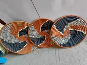 Handwoven Raffia Sunburst Wall Basket – Natural Terracotta
