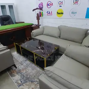 Coffee Table: Glass Table With Leather Sides Tufted With Crystals