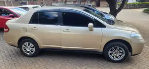Nissan Tiida 1.5L 16V 2010 Gold