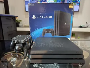 Playstation 4 Pro 1tb: 2 Original Controllers, Charging Dock, 10 Games