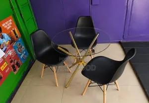 Round Table and Three Chairs