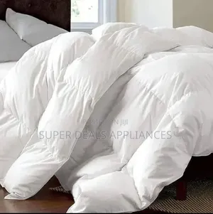 A Set of White Cotton Unbinded Duvet