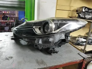 Mazda Axela Headlight Letter F Xenon