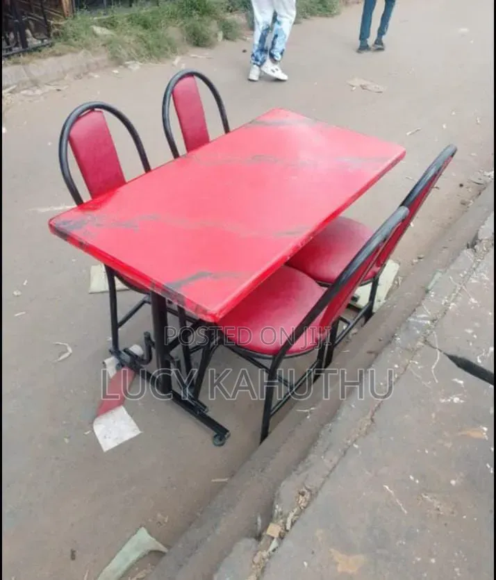 Red Marble Top With Four Chairs
