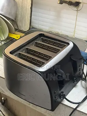 Clean, Used 4-Slice Stainless Steel Toaster