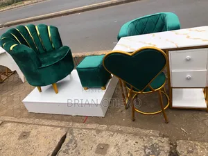 Podium. Styling Chairs. Love Seats With Nails Tables