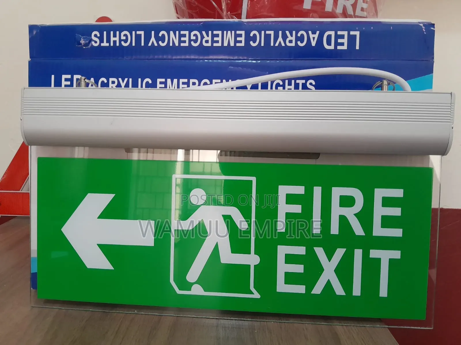Illuminated Led Fire Exit Sign With A Brushed Housing Acrylic Panel.