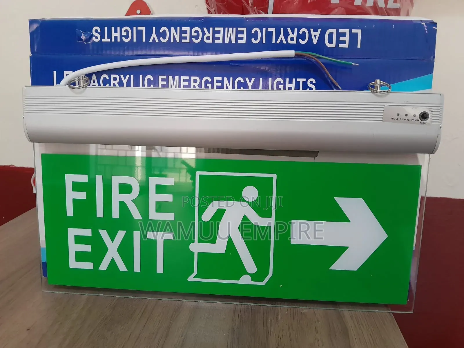 Illuminated Led Fire Exit Sign With A Brushed Housing Acrylic Panel.