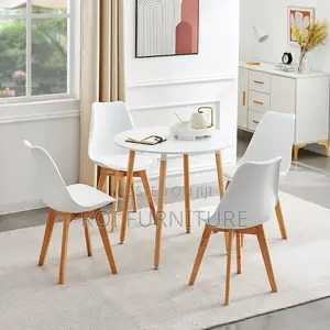 Dining Chairs; Plastic Eames Upholstered Dining Chairs