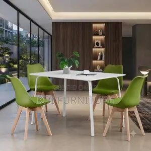 Dining Chairs; Plastic Eames Upholstered Dining Chairs