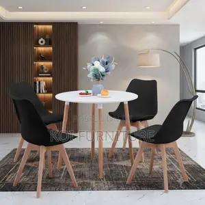 Dining Chairs; Plastic Eames Upholstered Dining Chairs