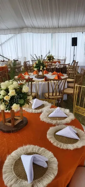 Tables With Flowers/ Center Pieces,Hire for Events Tents Also