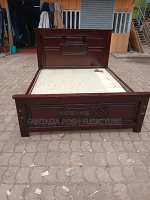 Brown 5 X 6 Wooden Bed
