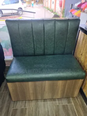 Green Restaurant Couch With a Sleek Laminate Finish.