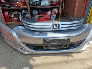Honda Insight Front Bumper Complete With Foglights and Reflector