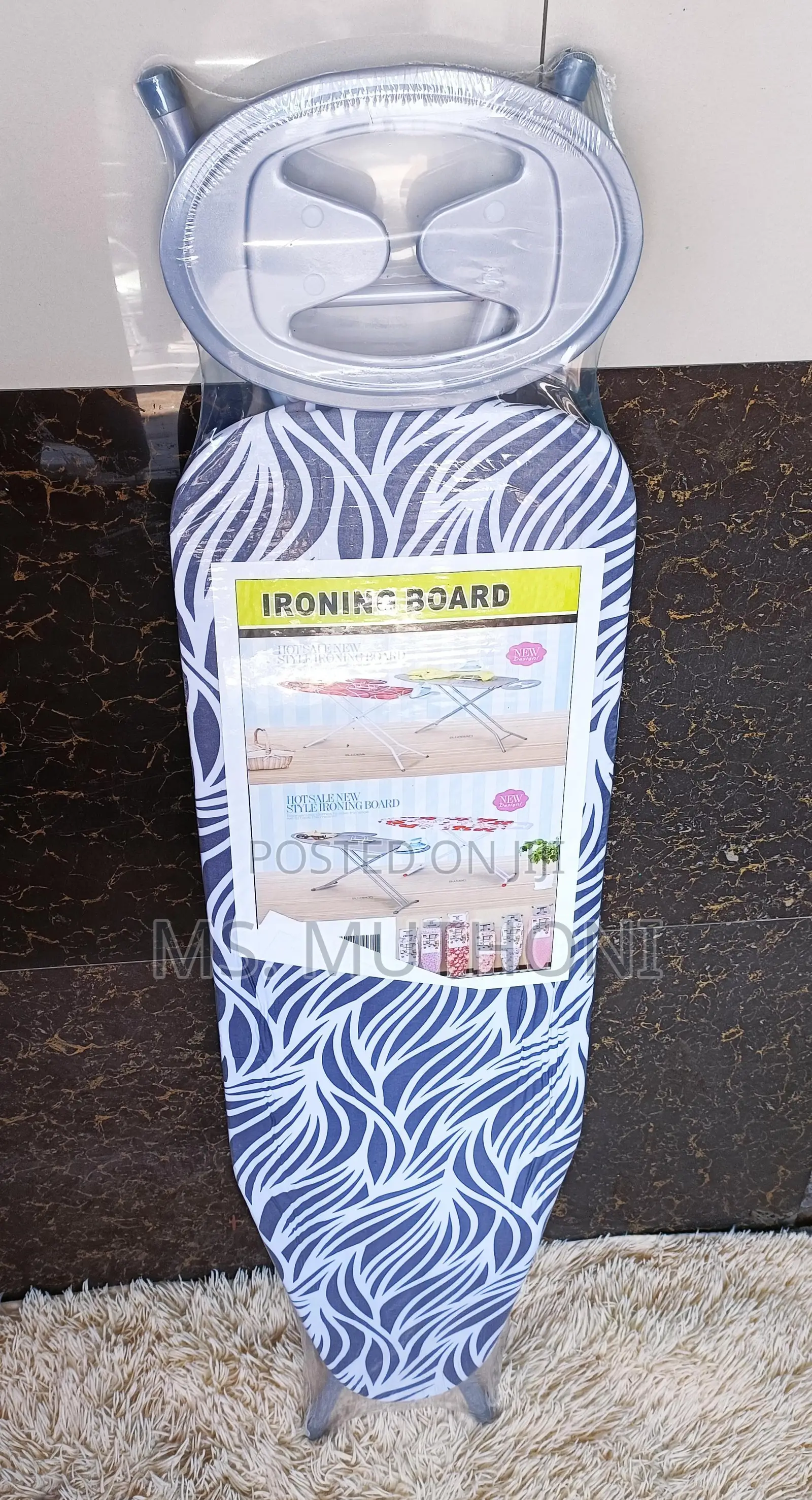 Foldable Ironing Board Featuring a Patterned Board