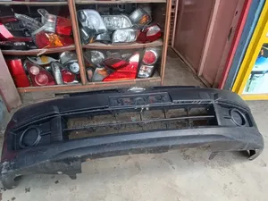 Bumper Front Nissan Ad Complete With Grill and Covers