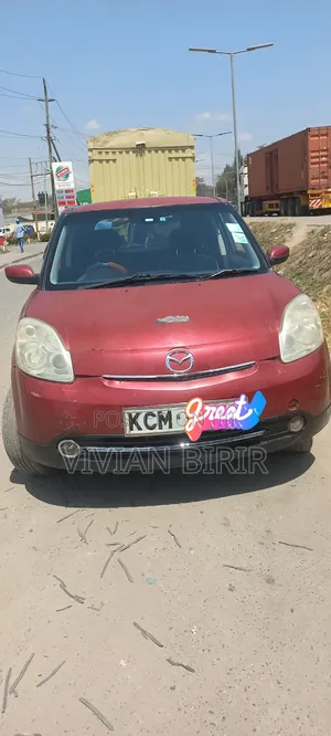 Mazda Verisa 2010 Red