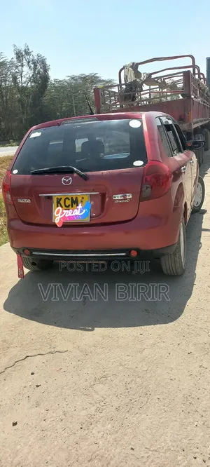 Mazda Verisa 2010 Red