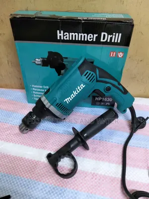 Power Makita Impact Hammer Drill 240 v 710 Watts and Free Bits