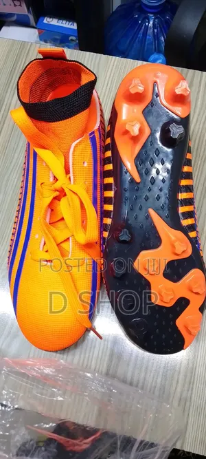 New Orange Soccer Boots