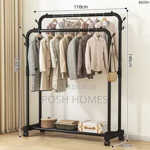 Double Pole Clothing Rack With Wheels Lower Storage