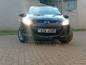 Mazda Demio 2012 Brown