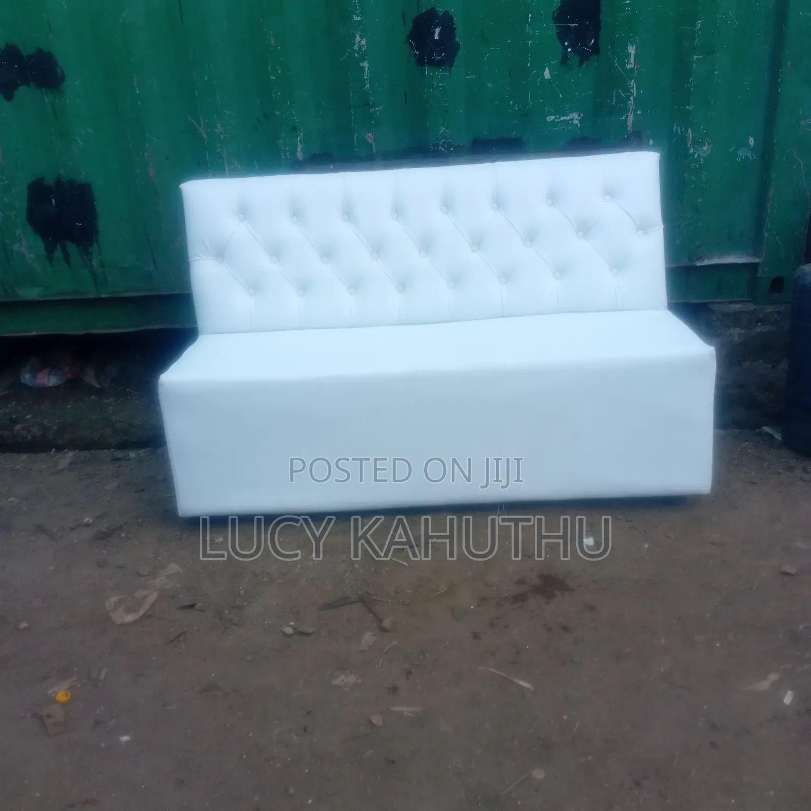 White Couch With Polished Wood Legs