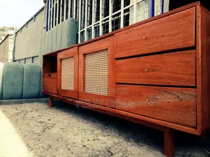 Mahogany TV Stand With a Rattan Finish