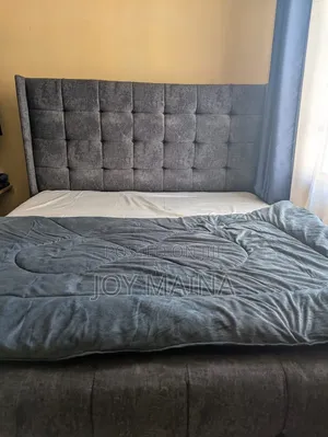 Modern 6x6 Upholstered Bed With a Charcoal Grey Tufted Headboard