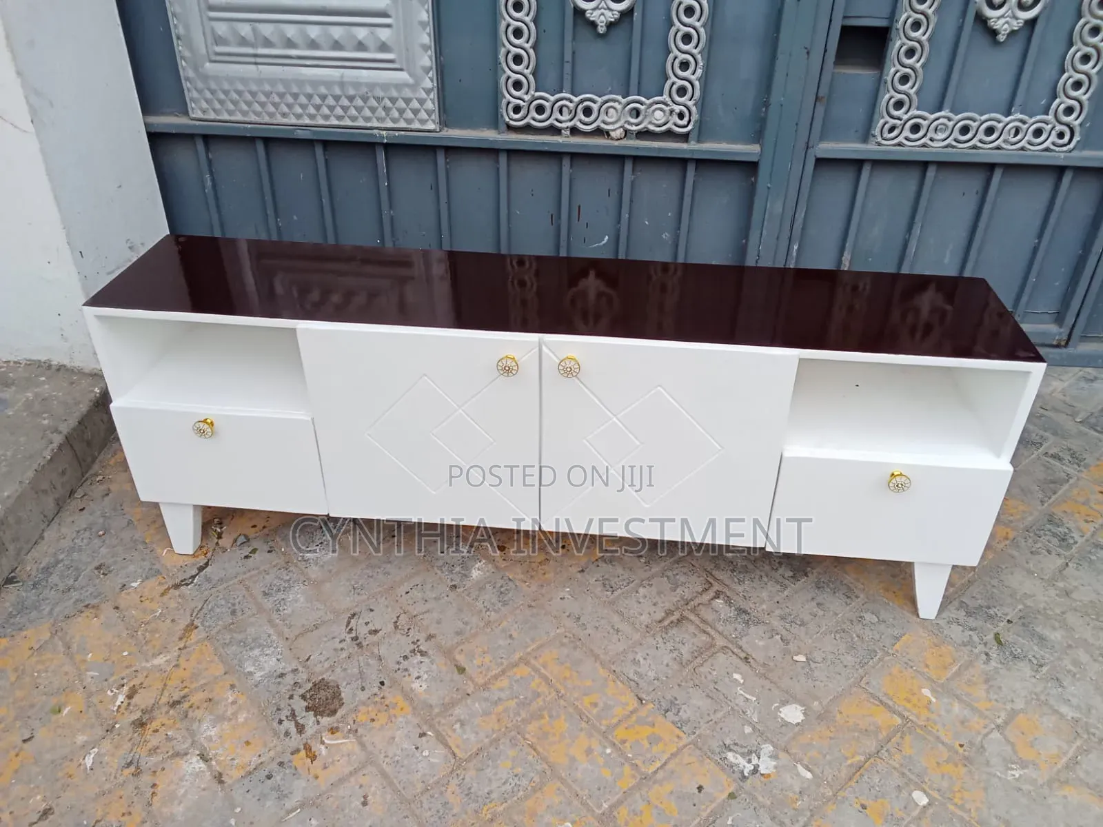Brown and White TV Stand