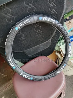 Mazda Steering Cover With Text Logo Accented by Blue