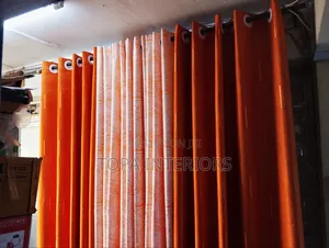 Orange Curtains That Brings Ambience to Your Space