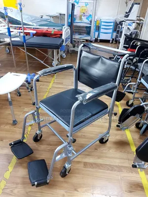 Commode Chair With Backrest and Castors and Footrest