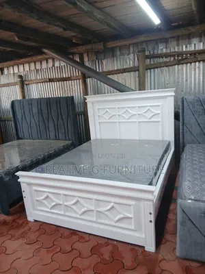 A Comfortable 5by6 Wooden Bed