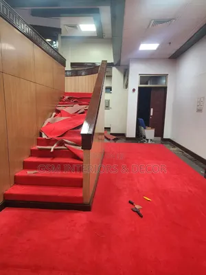 Wall to Wall Red Carpets on Stairs During Installayion